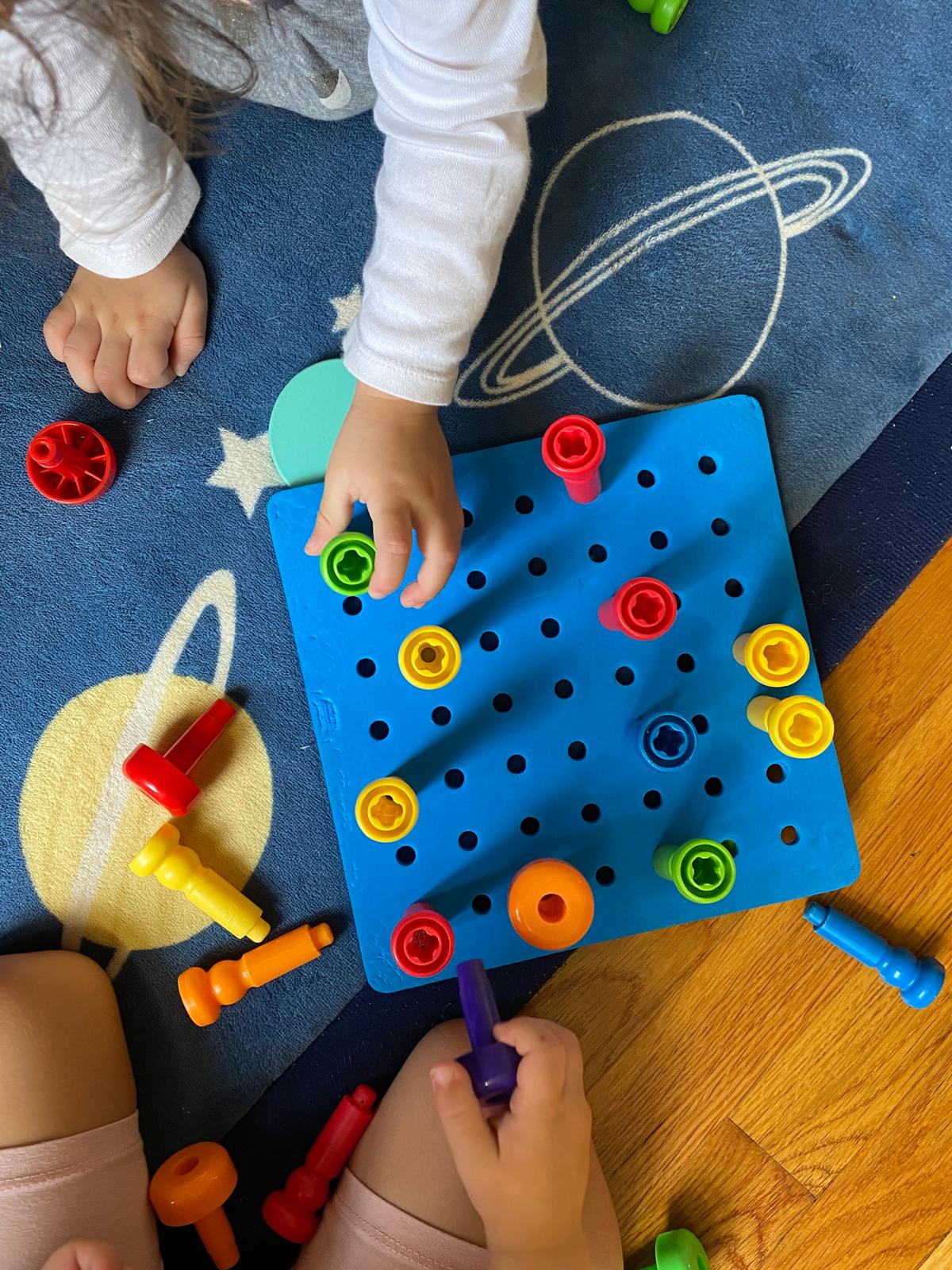 Fine motor pegboard play